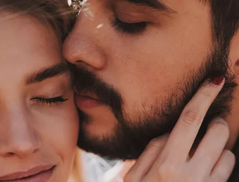 couple with faces close